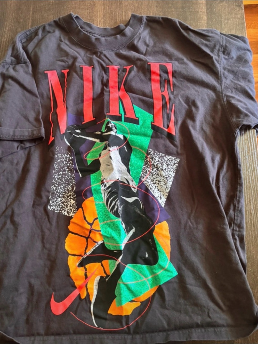 Nike Black Short-Sleeve Tee with Multicolor Basketball Graphic